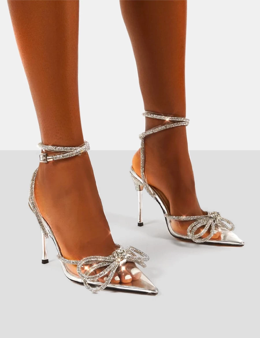 Public Desire Clear Perspex Women's High Heels with Diamante Bow & Pointed Toe - Wide Fit Wrap Around Design